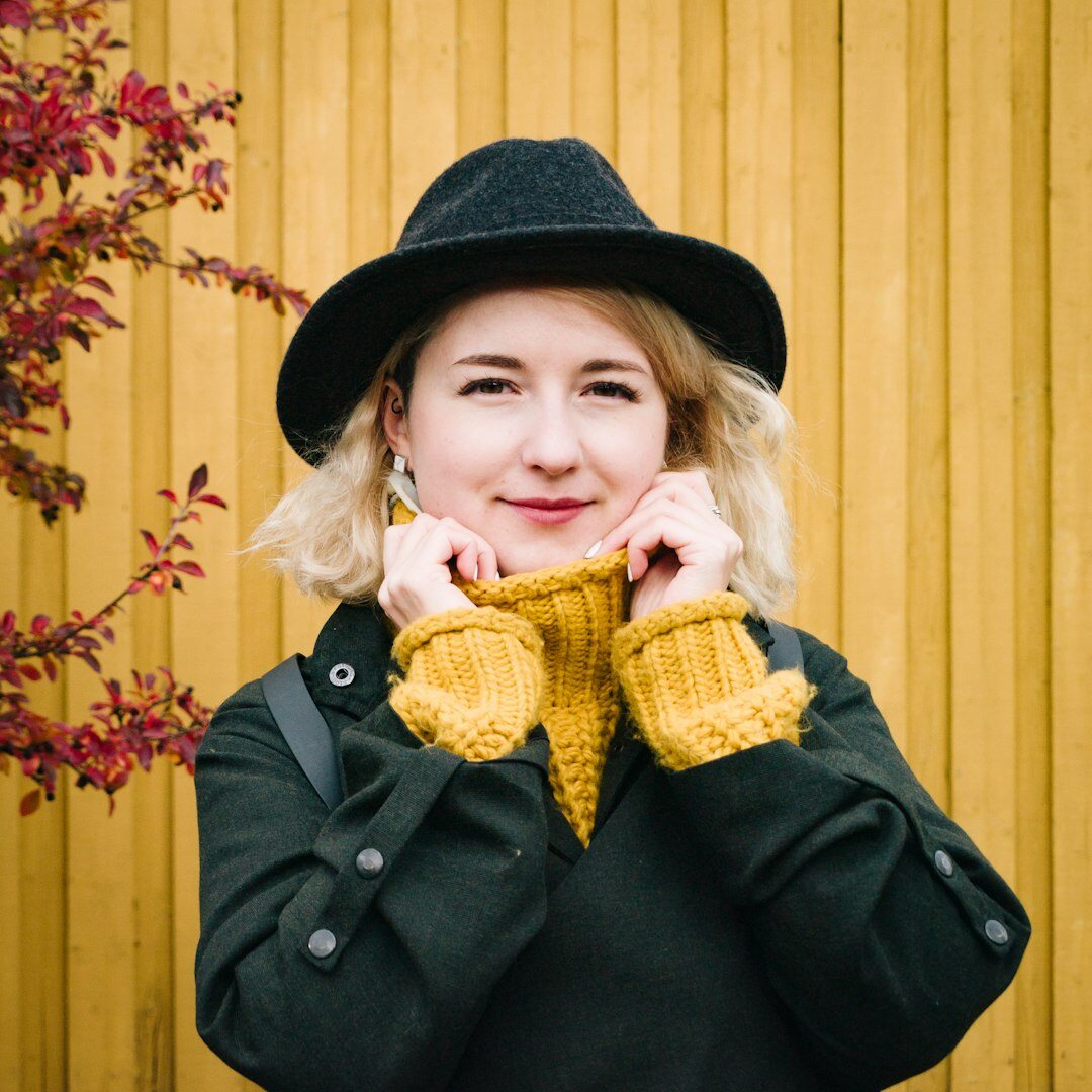 Professional European woman with blonde hair and confident smile