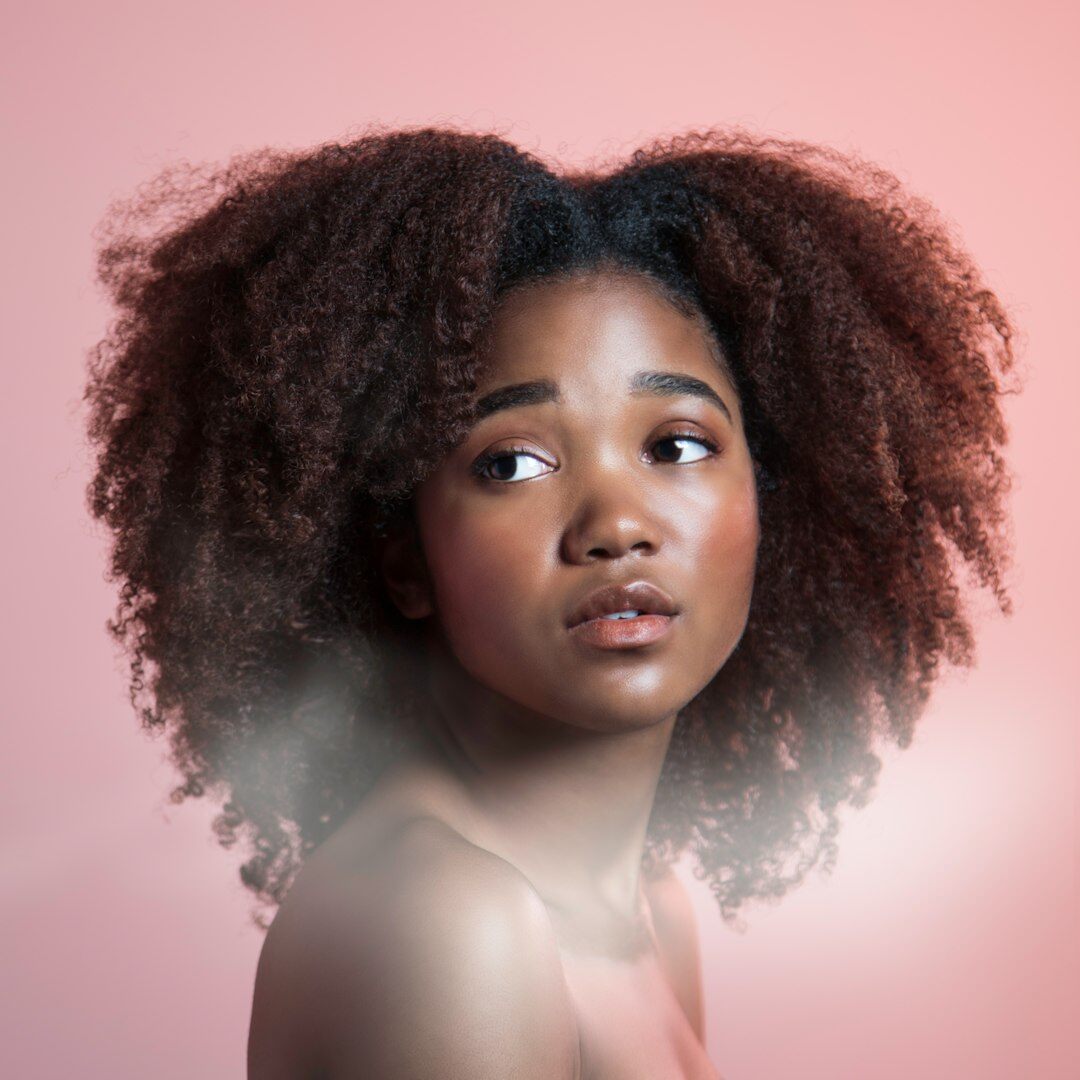 Young European professional woman with curly hair